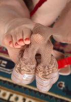 Olga kicking her stockings off of her sexy legs., Olga Cabaeva (olg033) ATK Natural & Hairy: Olga Cabaeva (Olga kicking her stockings off of her sexy legs.)